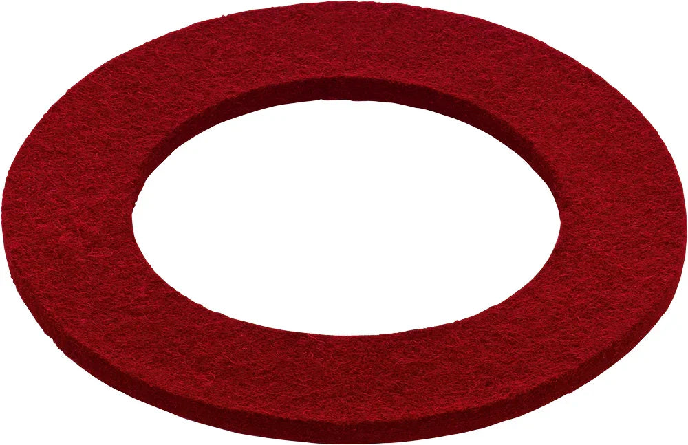 Red felt ring cushion for singing bowl, isolated on white background