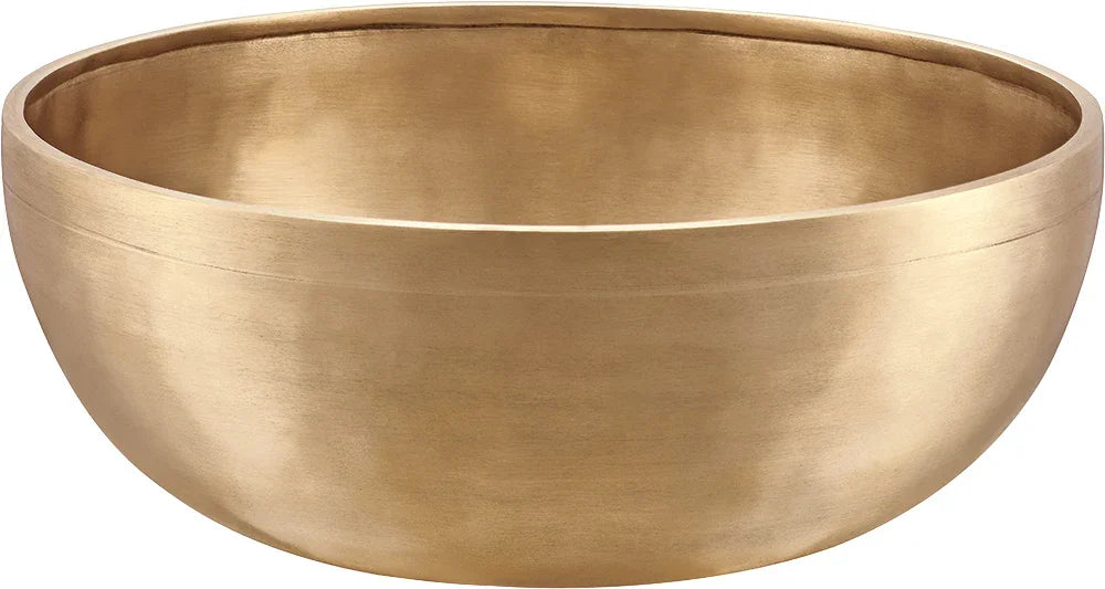 Large brass singing bowl for sound healing and meditation, isolated on white background