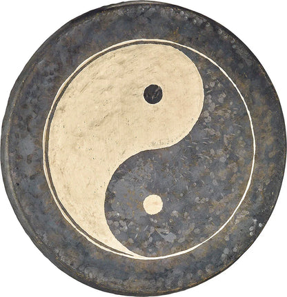 Hand-hammered gong with a gold yin yang symbol, energy and sound healing instrument