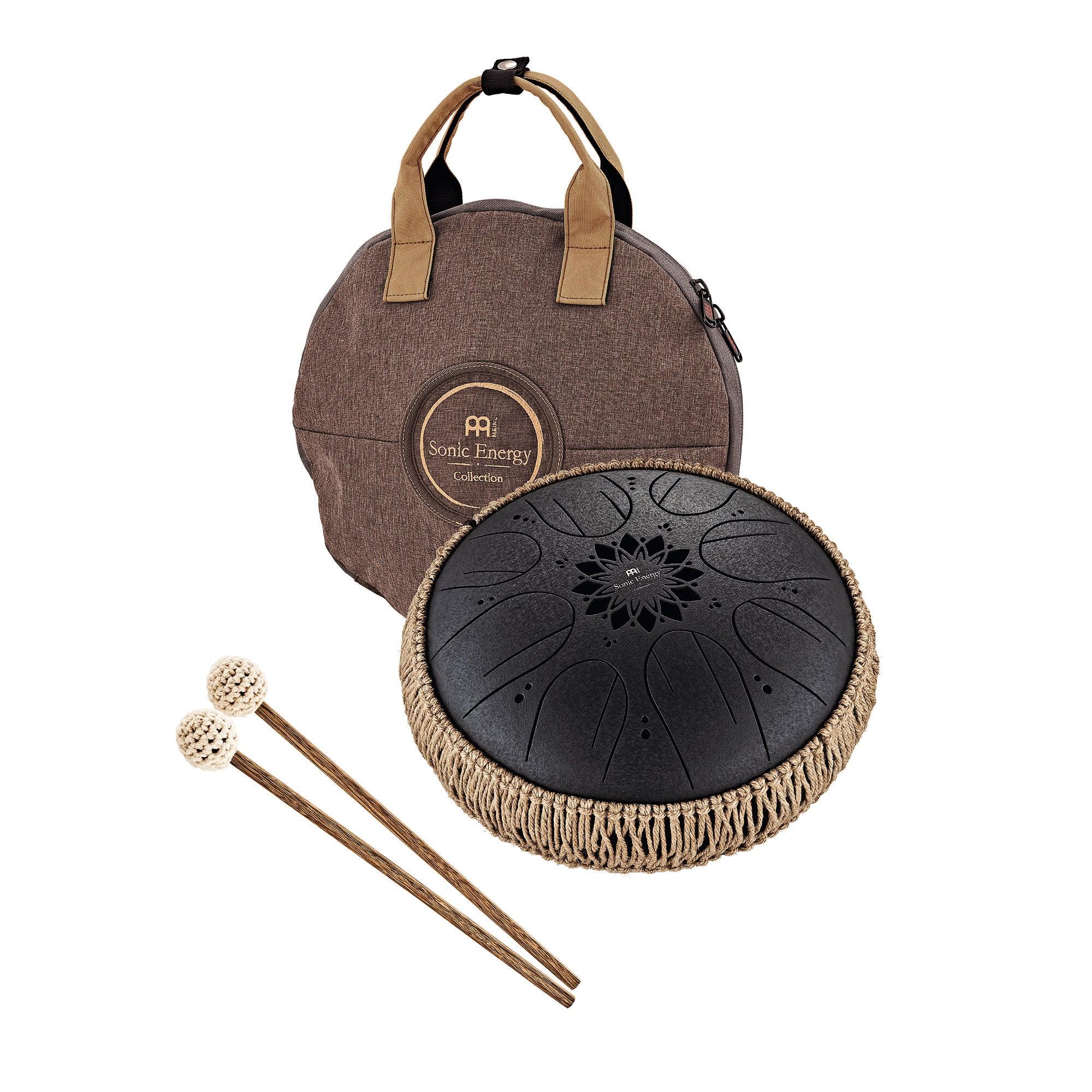 Black steel tongue drum with decorative rope, mallets, and carrying case for sound healing