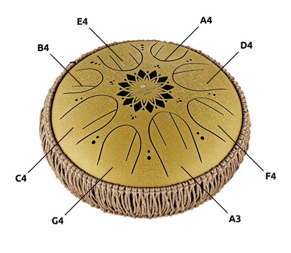 Gold steel tongue drum with floral cutout, rope trim, and musical note labels for sound healing
