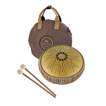 Steel tongue drum with decorative cutouts, carrying bag, and mallets for sound healing.