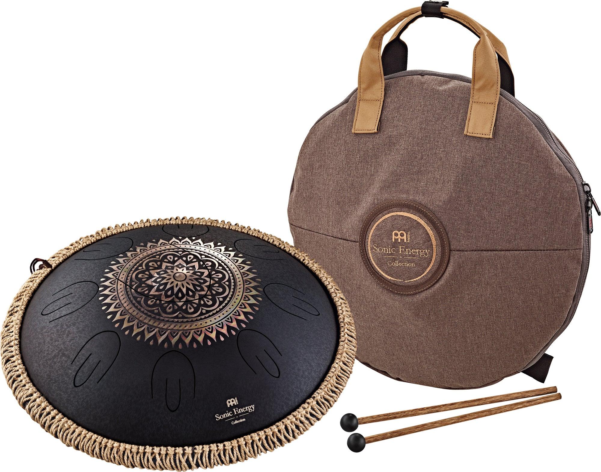 Decorative steel tongue drum with mandala design, carrying bag, and mallets for sound healing.