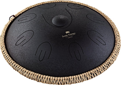 Black steel tongue drum with engraved note patterns and braided rope edge, for sound healing