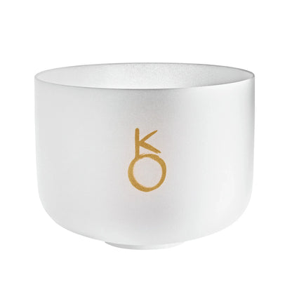 Frosted crystal singing bowl with gold symbol, used for sound healing and meditation
