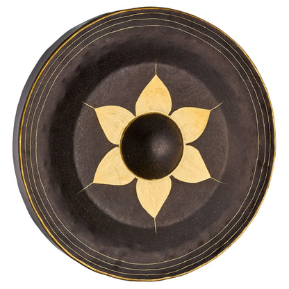 Handcrafted metal gong with flower design, ideal for sound healing and meditation